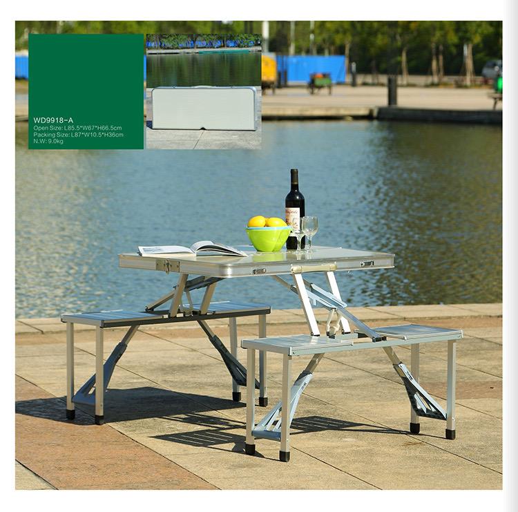 Portable and foldable camping table